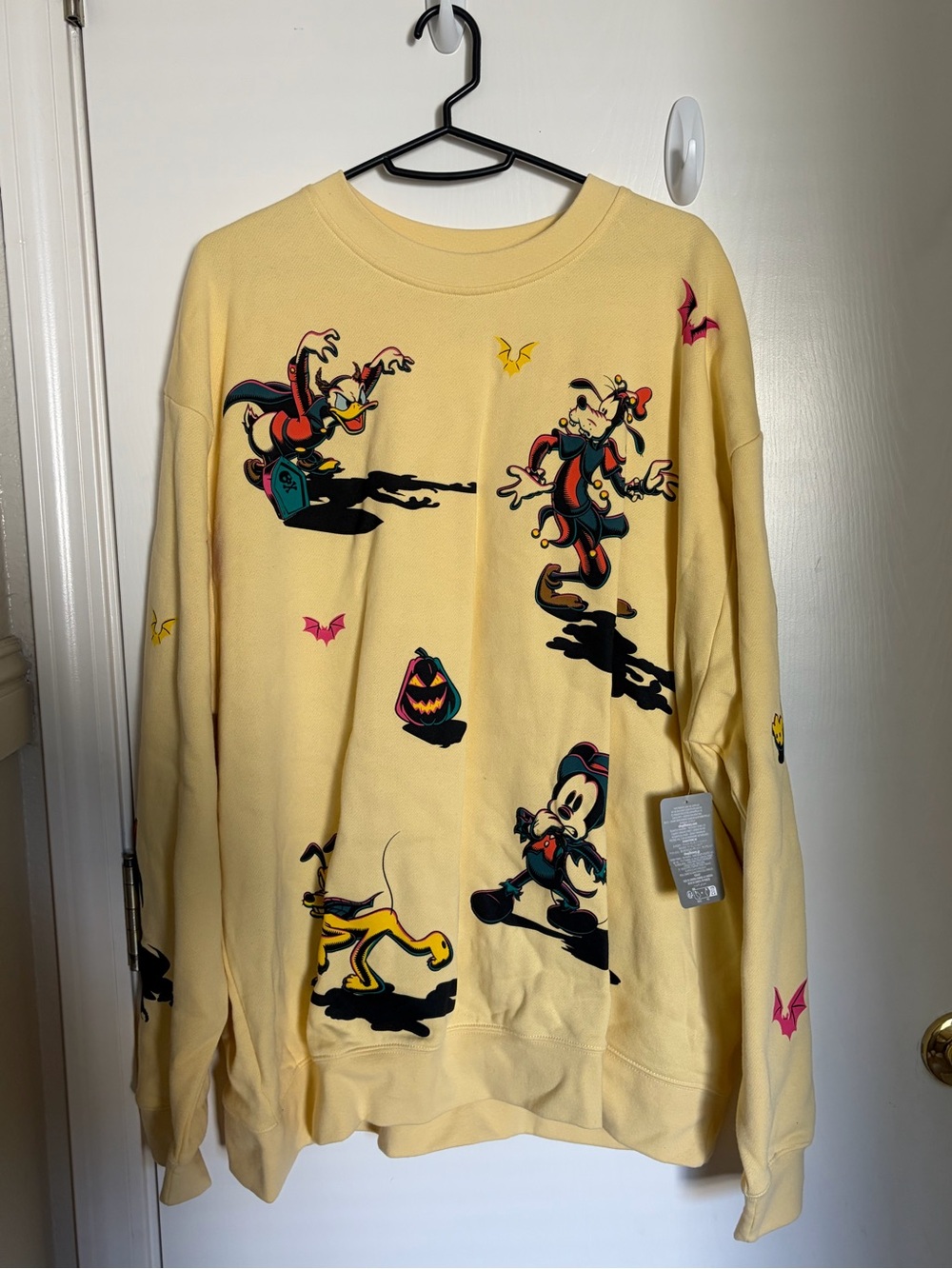 Disney Halloween Mickey and Friends yellow graphic crew neck sweatshirt